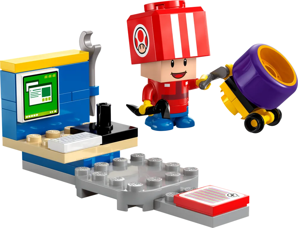 LEGO Super Mario 30702 Toad (Pit Crew) set build showing Toad, a workstation with a computer, and a small cement mixer.