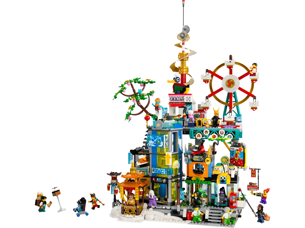 A large, colorful LEGO Monkie Kid city build with a towering Ferris wheel and intricate details.