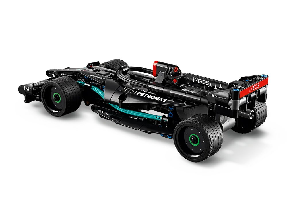 An angled view of the LEGO Technic Mercedes-AMG F1 W14 E Performance race car, black with teal accents, on a white background.