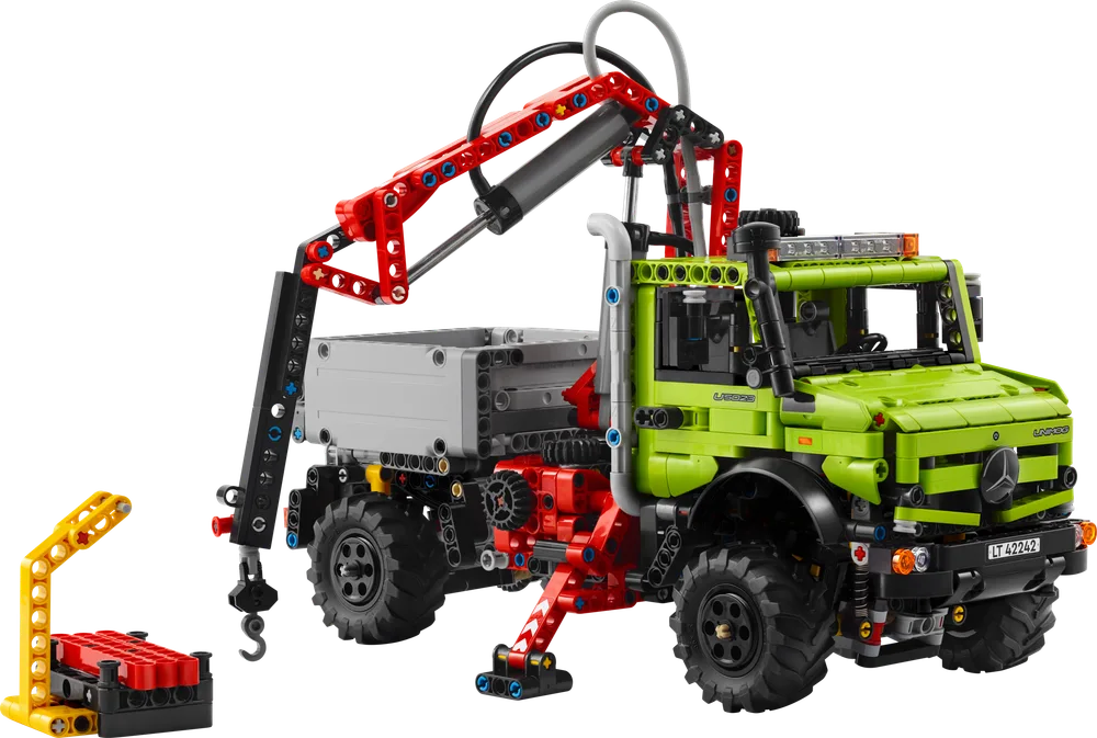LEGO Technic Mercedes-Benz Unimog U 5023 with fully extended crane arm and pallet attachment.