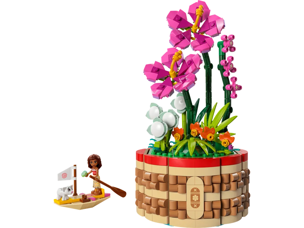 Full view of the LEGO Disney Moana’s Flowerpot build, featuring vibrant pink flowers and green foliage in a textured pot, with Moana and Pua in a small canoe beside it.