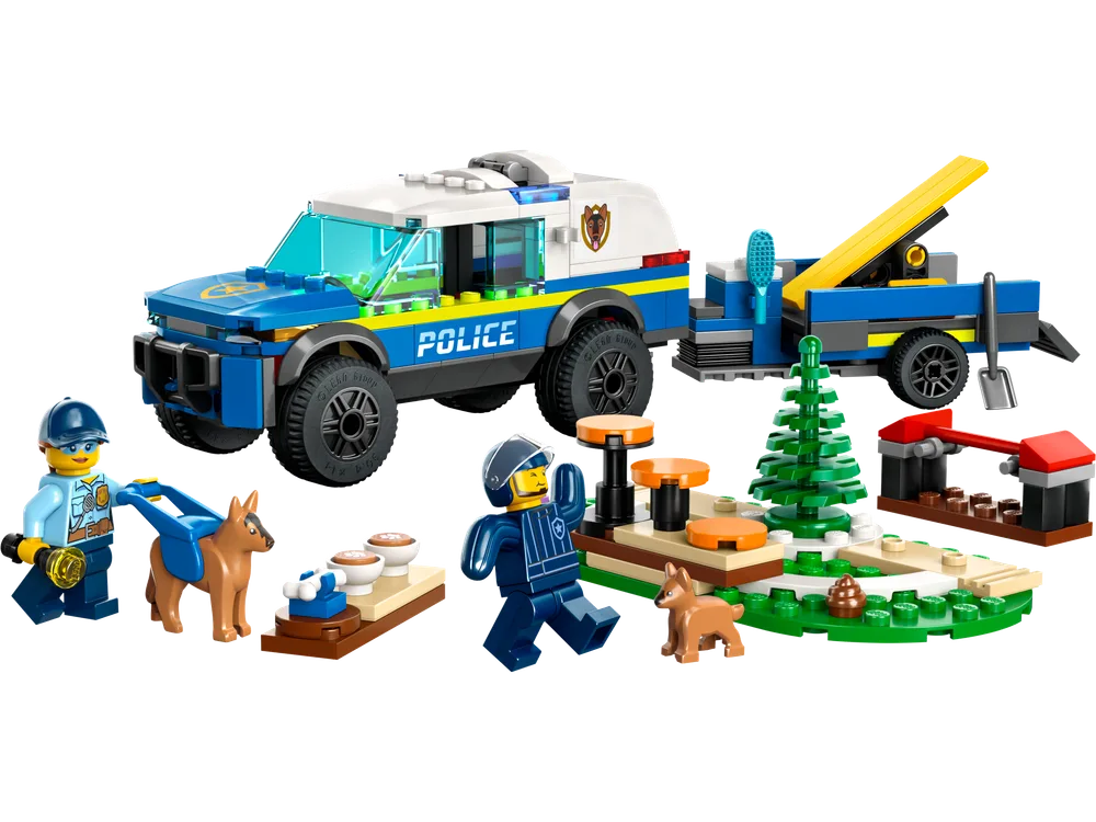 Full LEGO City 60369 Mobile Police Dog Training set: blue and white police truck, detachable trailer, two minifigures, two dogs, and a green baseplate with training obstacles.