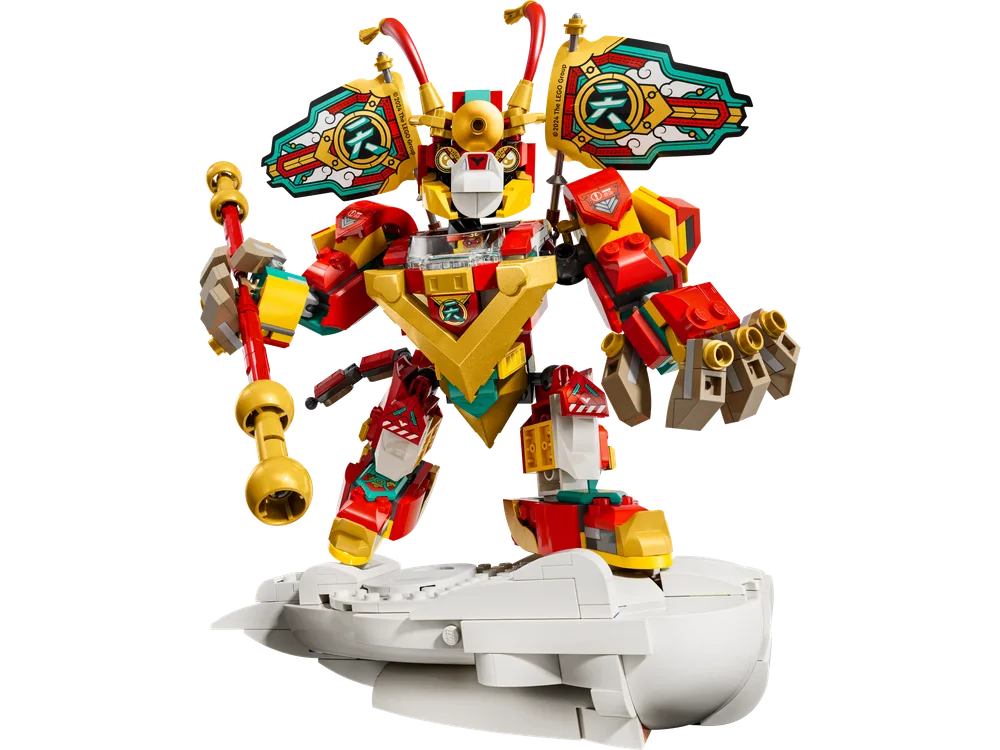 A large red and gold LEGO Monkie Kid mech stands dynamically on a white cloud base, holding a long gold staff.
