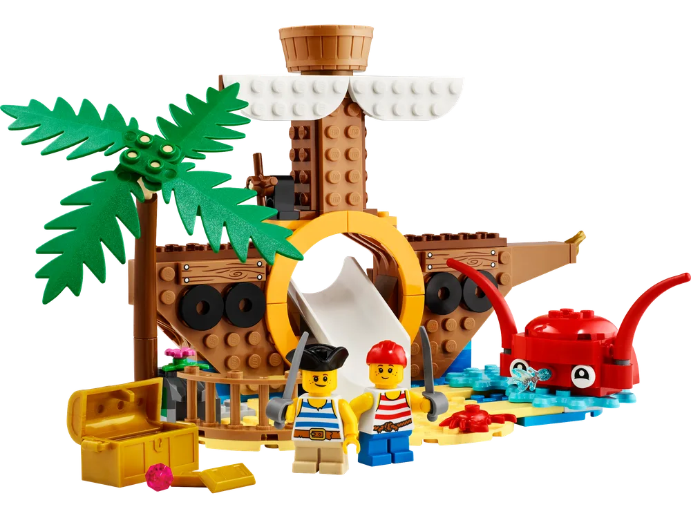 A LEGO pirate ship playground set featuring two pirate minifigures, a palm tree, a red squid, a golden treasure chest, and a white slide.