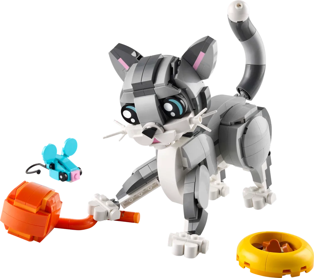 LEGO Creator 3-in-1 Playful Cat pouncing on an orange yarn ball toy with a blue mouse nearby, showcasing its articulated body and charming printed eyes.
