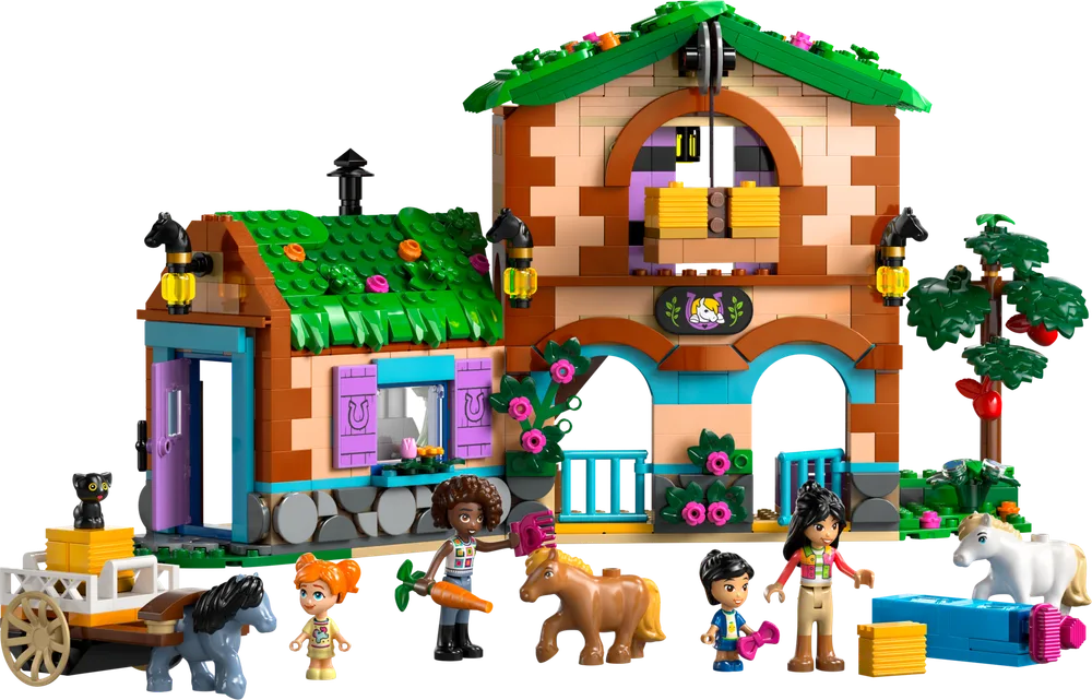 Full view of the LEGO Friends Pony Ranch & Stable set 42654, with minifigures Autumn, Siena, Emilia, three ponies, a cat, and a horse-drawn cart against a white background.