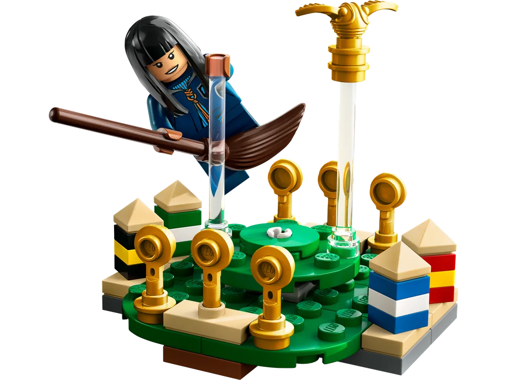 A close-up view of the LEGO Harry Potter 30651 Quidditch Practice set, featuring a Cho Chang minifigure on a broomstick, flying over a green circular base with four golden Quidditch hoops and a golden Snitch atop a trans-clear pole.