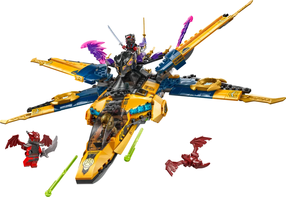 The LEGO Ninjago Ras and Arin's Super Storm Jet (71833) in full flight, showcasing its gold and blue color scheme, with Ras in a detachable flyer and Arin in the cockpit, battling two red dragon-like enemies.