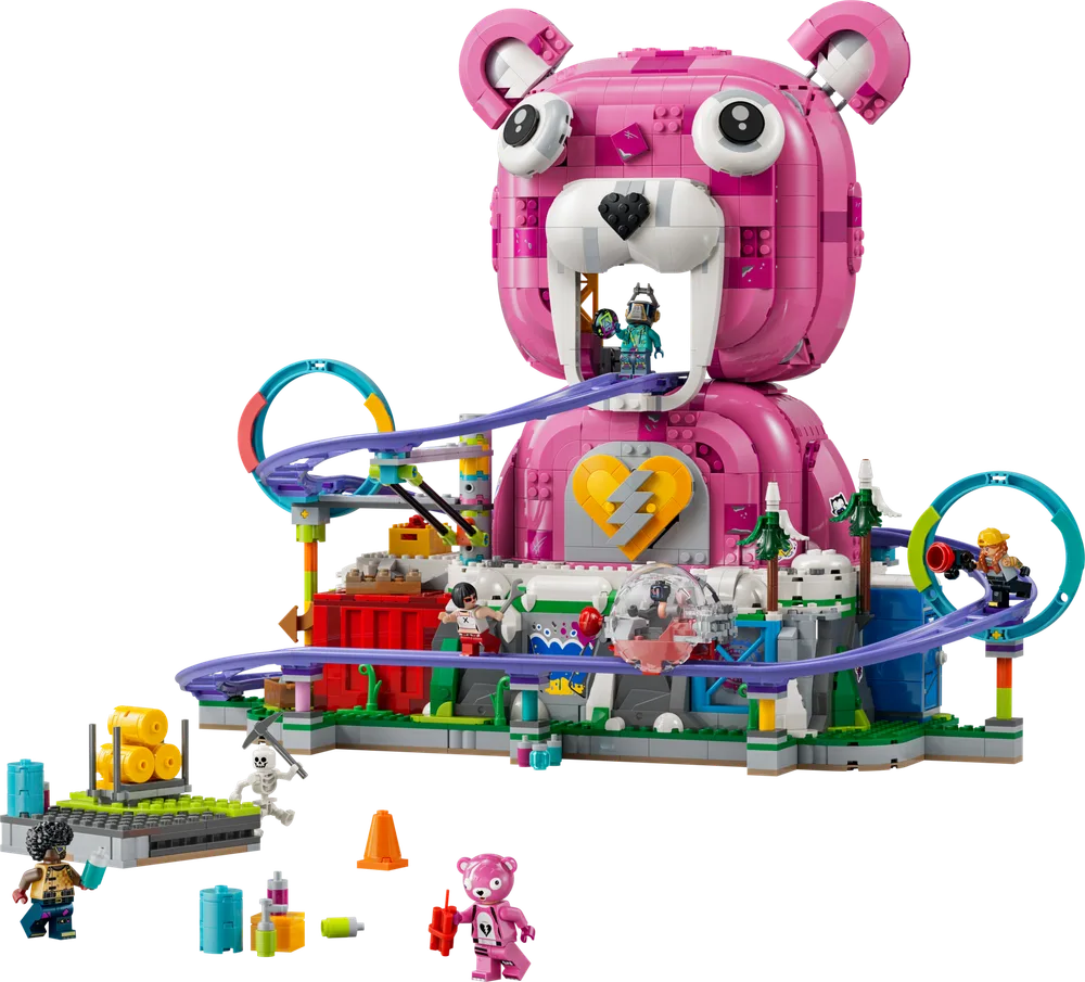The complete LEGO Fortnite Rave Cave 77082 set showcasing the vibrant pink Cuddle Team Leader central structure, a winding purple roller coaster, and several minifigures engaged in play, on a white background.