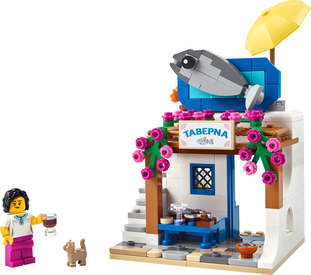 LEGO Restaurants of the World Greece set showing the front of the taverna with a minifigure and a cat.