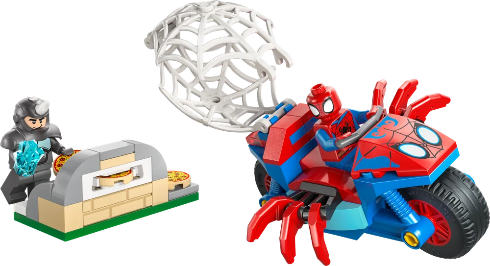 Spider-Man on a red and blue motorcycle with spider legs, pursuing Rhino who is standing next to a pizza oven with pizzas.