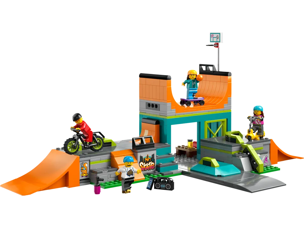 Full view of the LEGO City Street Skate Park set with multiple ramps, obstacles, and four minifigures performing tricks.