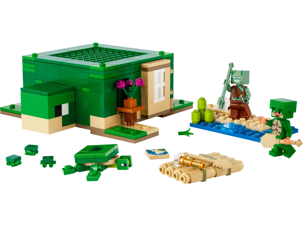 Full view of the LEGO Minecraft The Turtle Beach House (21254) set, featuring a green turtle-shaped house, a small sand island with water, a Drowned minifigure, a Turtle Skin Warrior minifigure, baby turtles, and a raft.