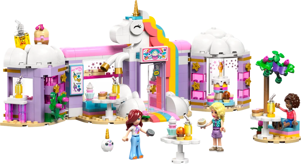 Full view of the LEGO Friends Unicorn Dream Café set with minifigures Alani and Paisley interacting around the colorful building and outdoor seating.