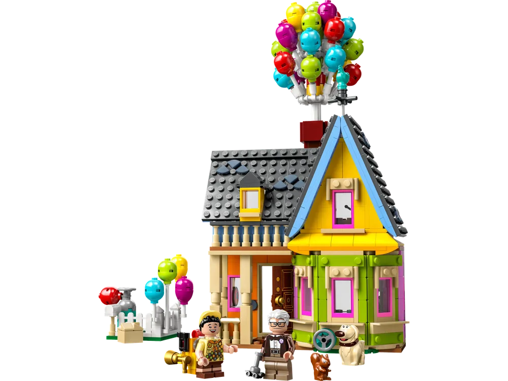 Front view of the LEGO Disney 'Up' House with Carl Fredricksen, Russell, and Dug minifigures.