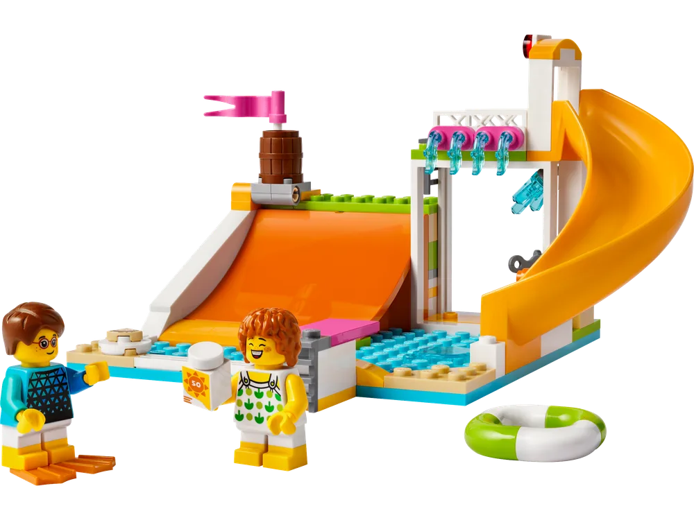 LEGO Friends Water Park 40685 set built with two minifigures, a boy with a surfboard and a girl with sunscreen, standing near an orange slide, water bucket, and splash area.