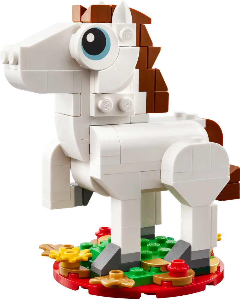A white LEGO horse with brown mane and tail, standing on a round red and green base with yellow flower elements, against a plain white background.