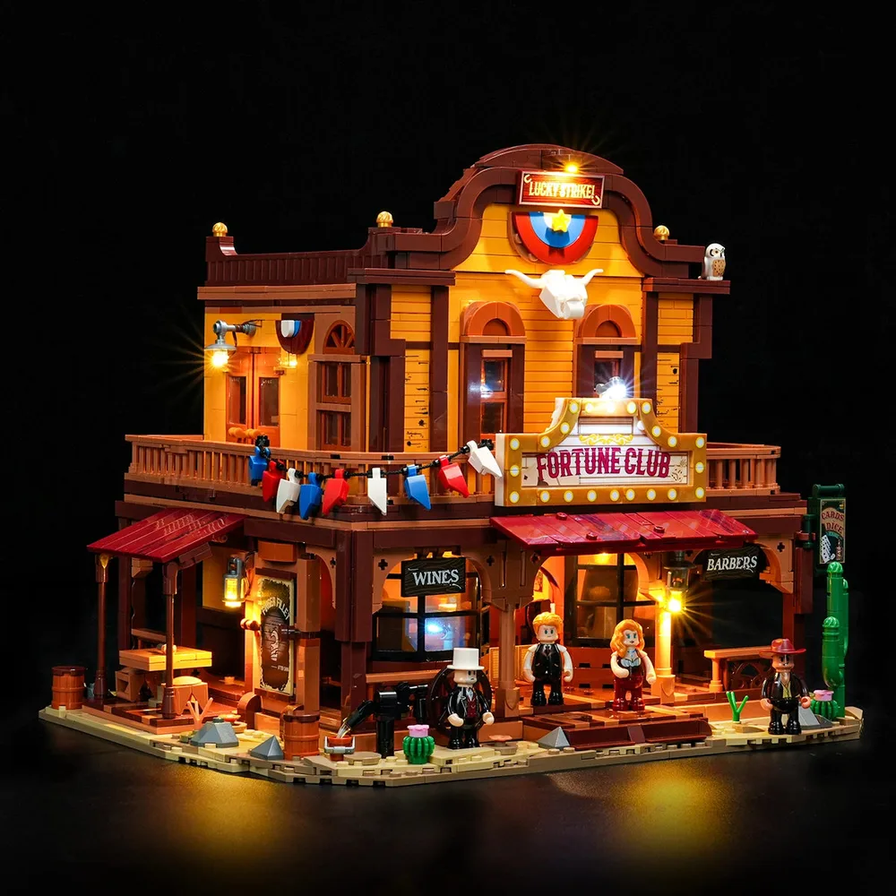 Lumibricks Western-themed Fortune Club and Barbershop building set lit up at night with warm interior and exterior lights.
