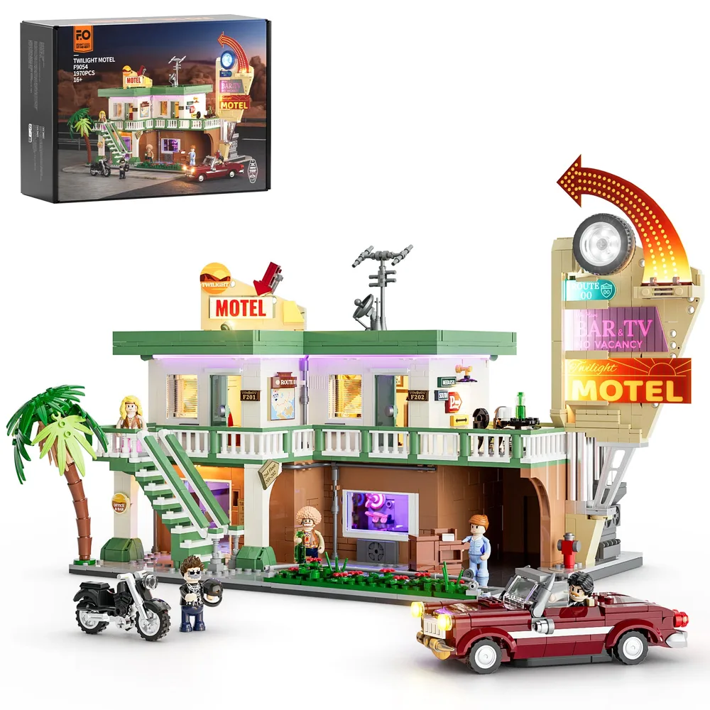 Detailed view of the Lumibricks Twilight Motel F9054 set, featuring a two-story motel with a large marquee sign, a red car, a motorcycle, and minifigures, all displayed in daylight with the product box visible.