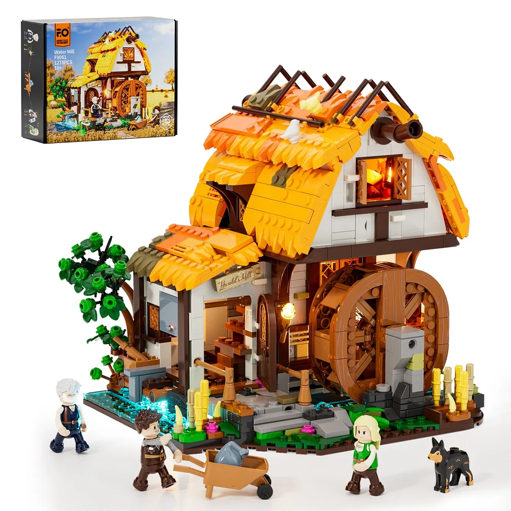 A Lumibricks Water Mill F9061 set box in the upper left corner, and the fully built water mill with minifigures and an illuminated water feature in the foreground. The mill features a multi-layered thatched roof, a large wooden waterwheel, and intricate landscaping with trees and fencing. Several minifigures and a dog are arranged around the base.