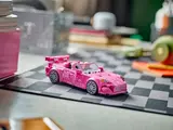 Lego S2000 on checkered mat.