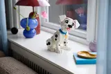 Puppy on windowsill display