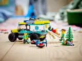 Close-up of LEGO paramedics loading an injured minifigure onto a stretcher.