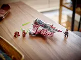 Jedi Interceptor set on wooden table.