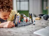 Child playing with LEGO set.