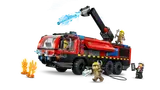 Fire truck and minifigures battling a fire.