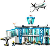 LEGO City Airport with terminal, control tower, and flying airplane.