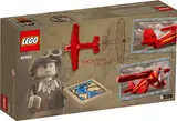 Back of LEGO box with minifigure and plane details.