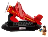 Red LEGO plane model on stand with Amelia Earhart minifigure.