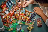 Placing minifigure on built LEGO inn.