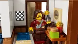 Traveler with lantern in inn room.