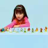 Child viewing the complete Minifigure Series 28.