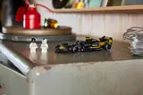 APXGP car and minifigures in a workshop.