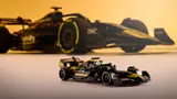 LEGO APXGP car with real F1 car in background.