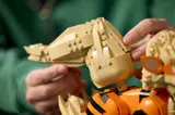 Attaching Arcanine's tail assembly