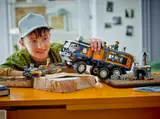 Child playing with Arctic truck set.