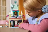 Girl playing with the LEGO Arendelle Frozen Castle.