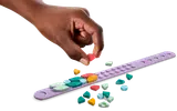 Customizing a LEGO bracelet.