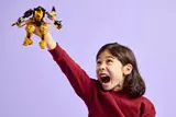 Child celebrates with mech.