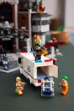 Arkham security van under attack.