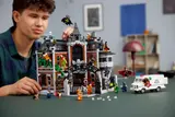 Builder playing with Arkham Asylum set.