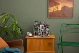 Arkham Asylum set on wooden table.