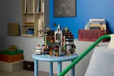 Arkham Asylum set on blue stool.