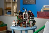 Arkham Asylum set on stool, elevated.