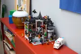 Arkham Asylum set on red cabinet.