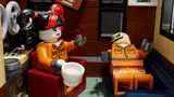 Harley Quinn and Scarecrow in cells.